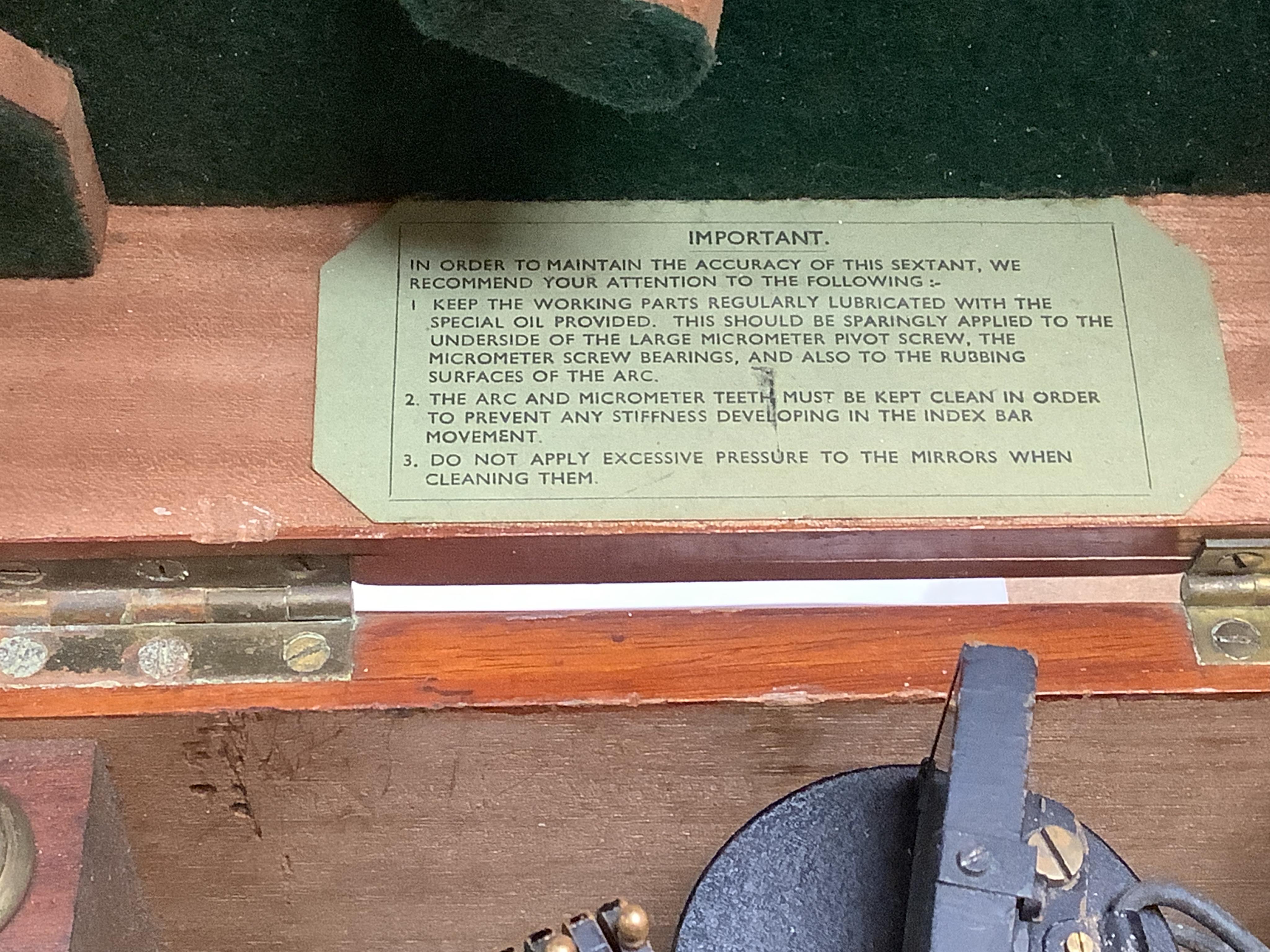 An early 20th century H. Hughes & Son Ltd. London, ‘Husun’ mahogany cased sextant, with engraved maker to the scale, also engrave serial number 29221, and with a battery pack for illuminating the scale, plaque to the ins